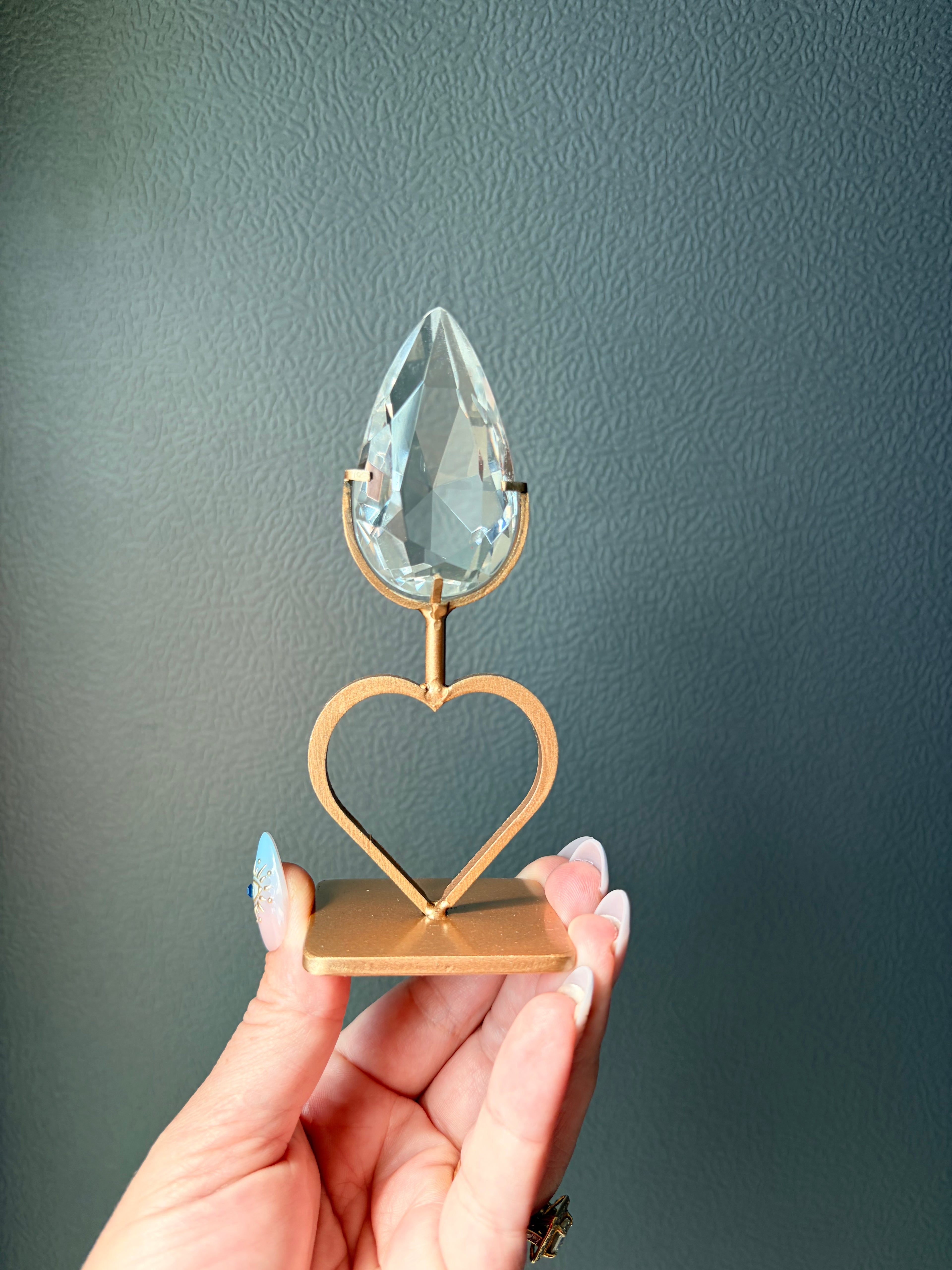 Faceted Clear Quartz Crystal on Heart Gold Stand