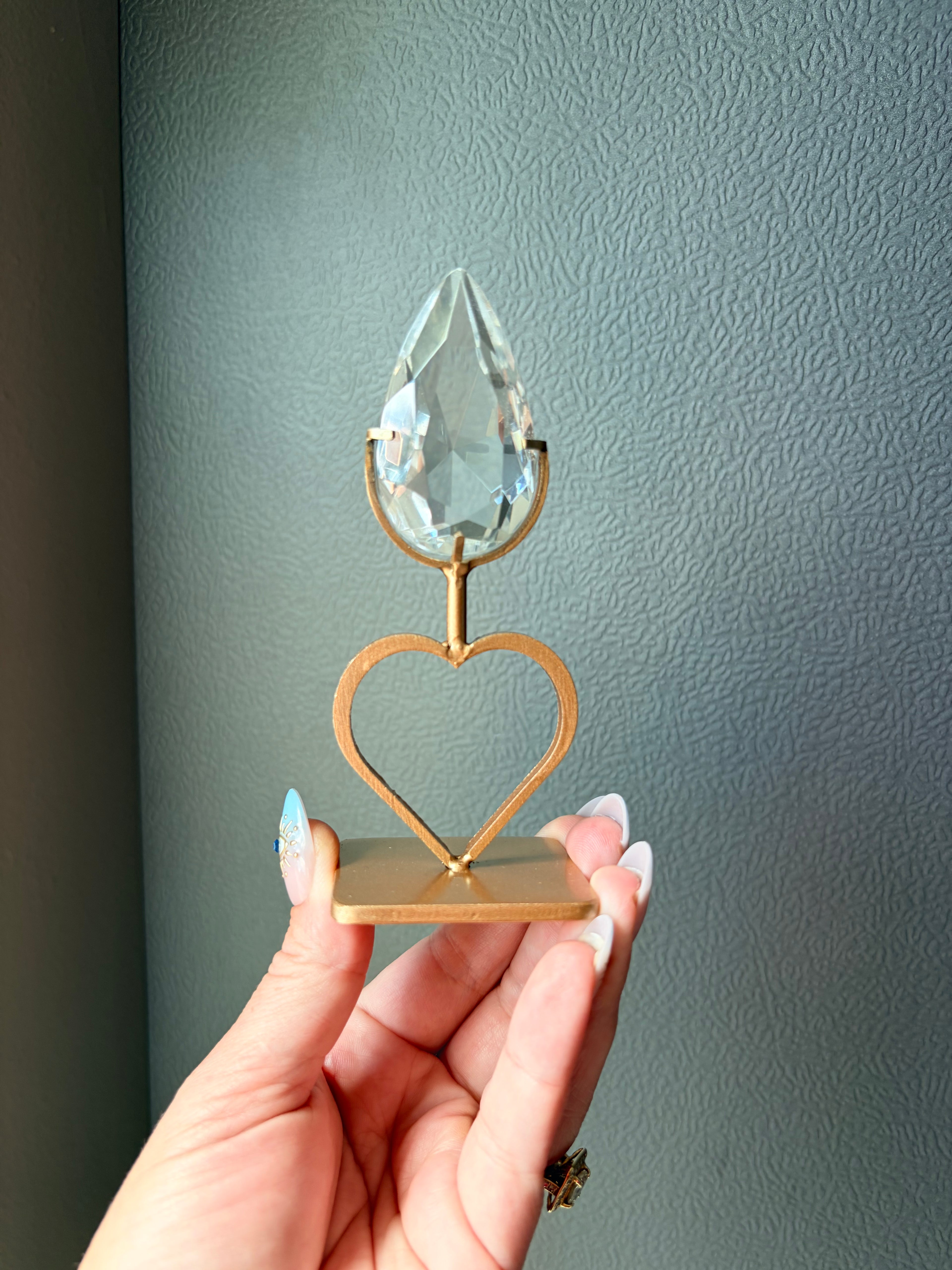 Faceted Clear Quartz Crystal on Heart Gold Stand