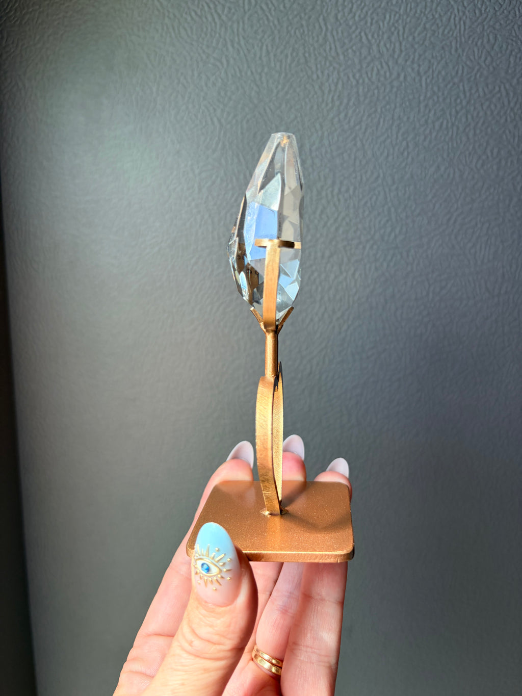 Faceted Clear Quartz Crystal on Heart Gold Stand