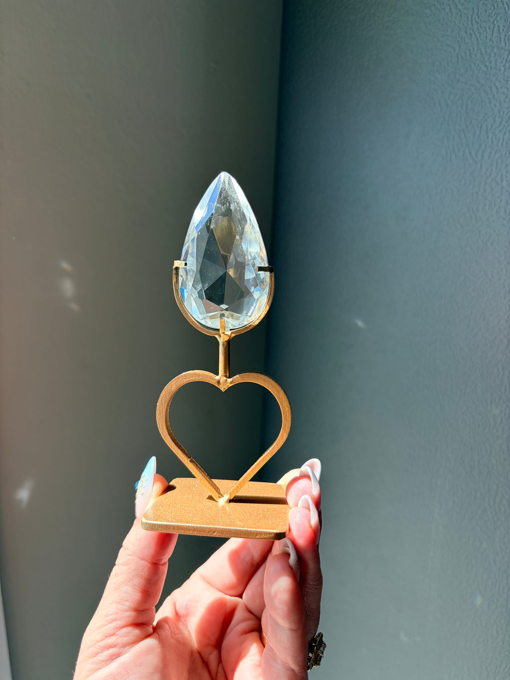 Faceted Clear Quartz Crystal on Heart Gold Stand