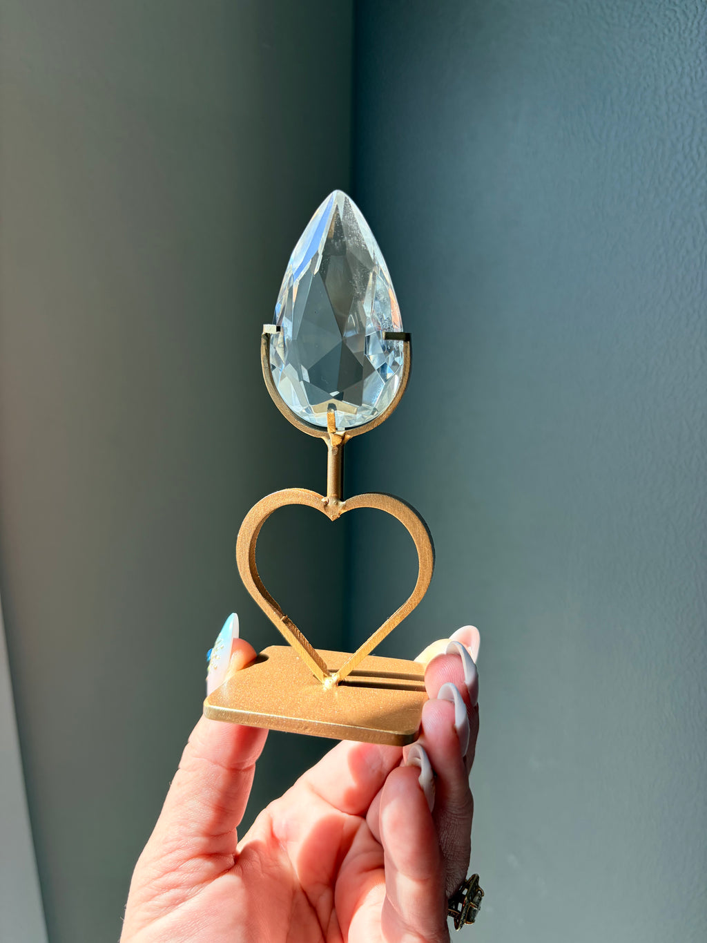 Faceted Clear Quartz Crystal on Heart Gold Stand