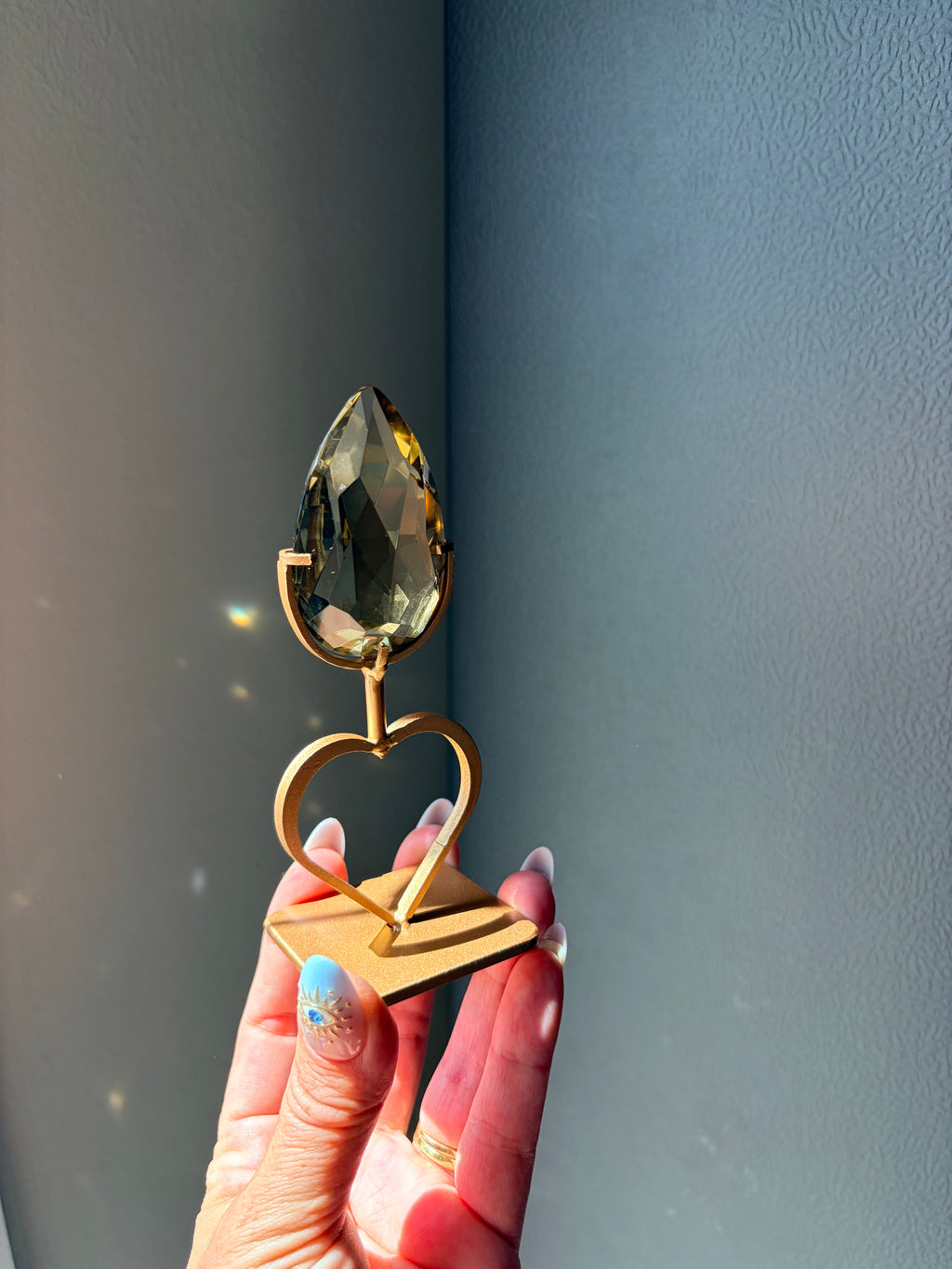 Faceted Citrine Gem on Heart Gold Stand