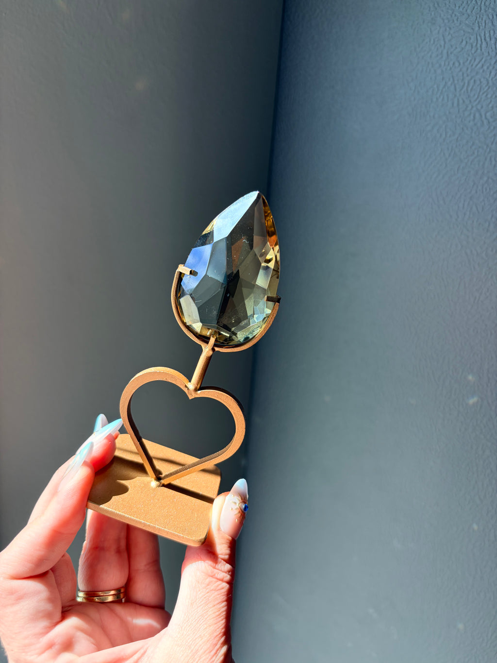 Faceted Citrine Gem on Heart Gold Stand