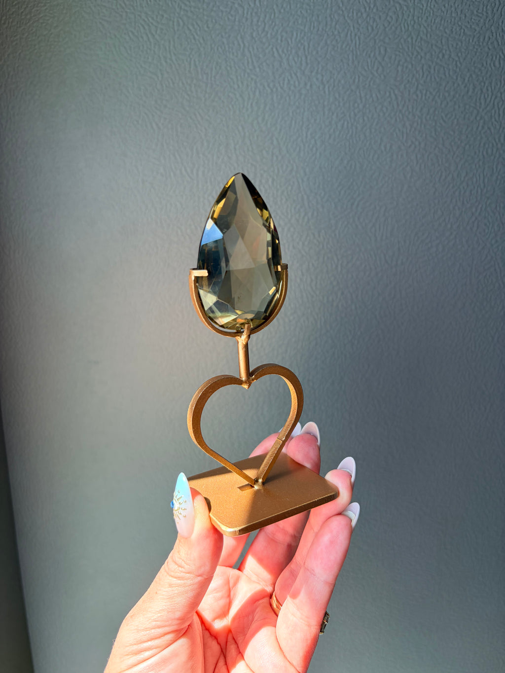 Faceted Citrine Gem on Heart Gold Stand