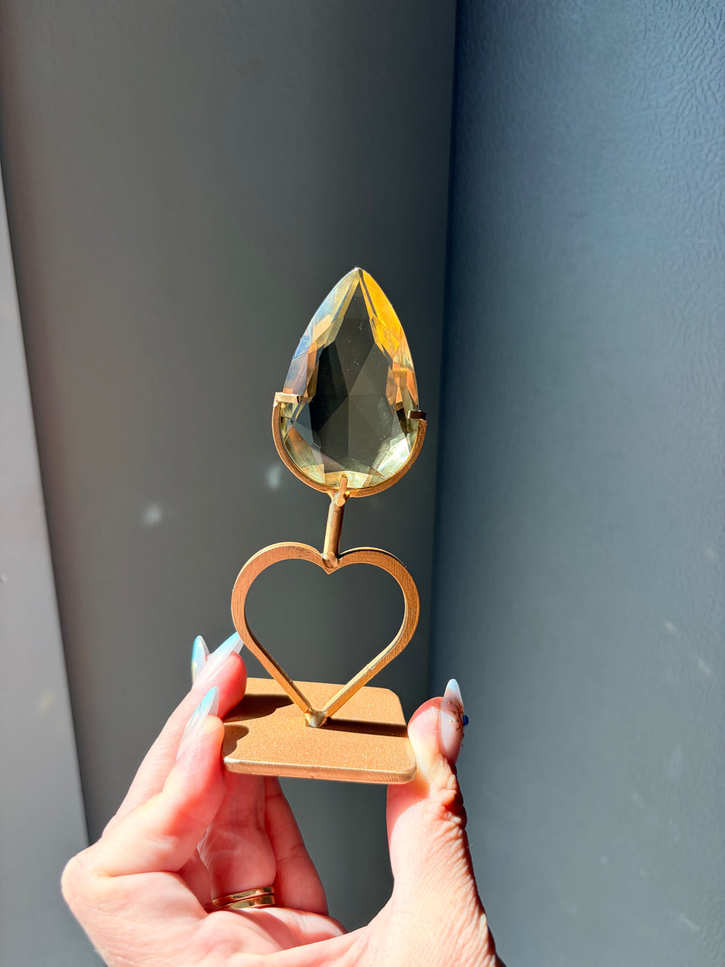 Faceted Citrine Gem on Heart Gold Stand