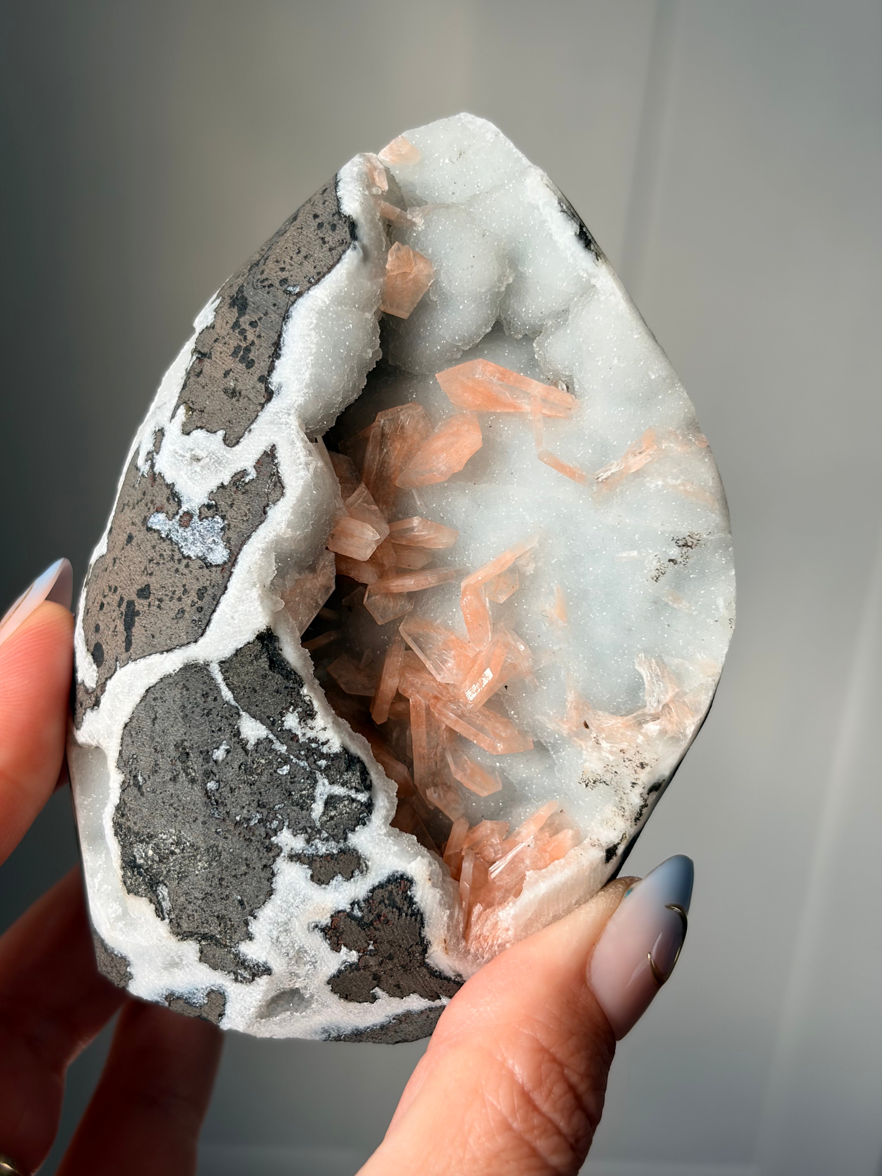 Peach Stilbite on Blue Chalcedony