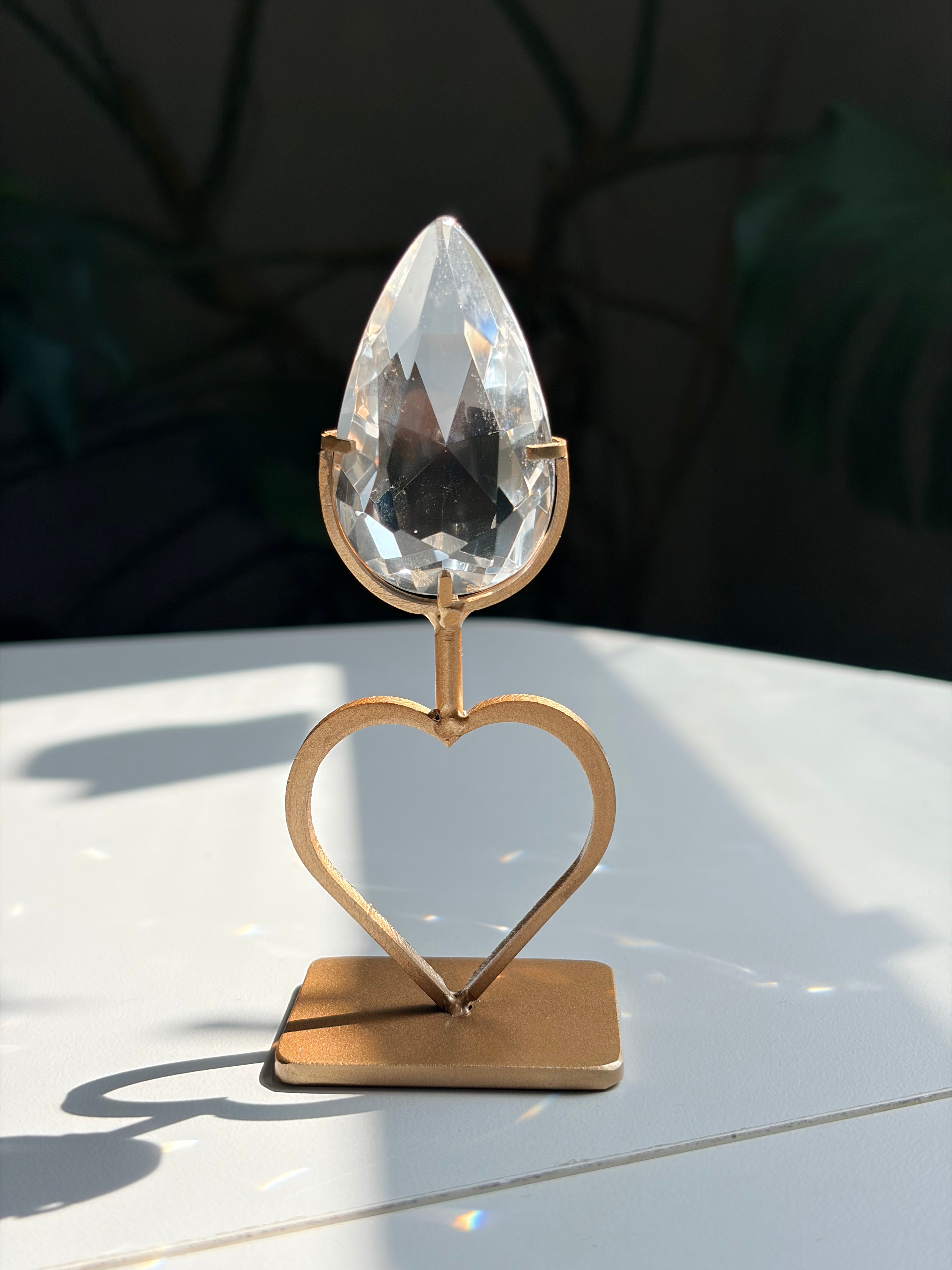 Faceted Clear Quartz Crystal on Heart Gold Stand