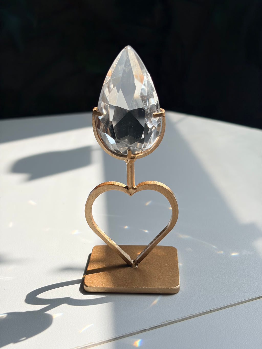 Faceted Clear Quartz Crystal on Heart Gold Stand